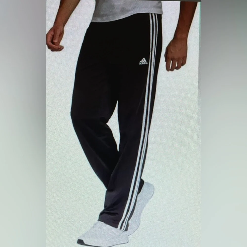 Adidas Men’s Joggers. Blue/grey color with black stripes.